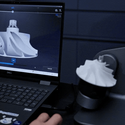 AutoScan Inspec2 automatically scanning a small machined component for dimensional inspection