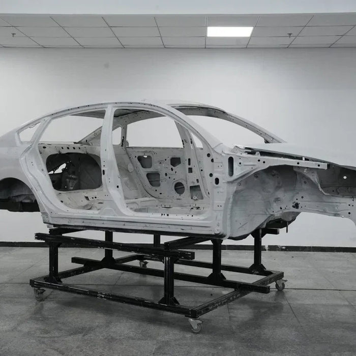 FreeScan UE Nova scanning a body-in-white structure in an automotive metrology area
