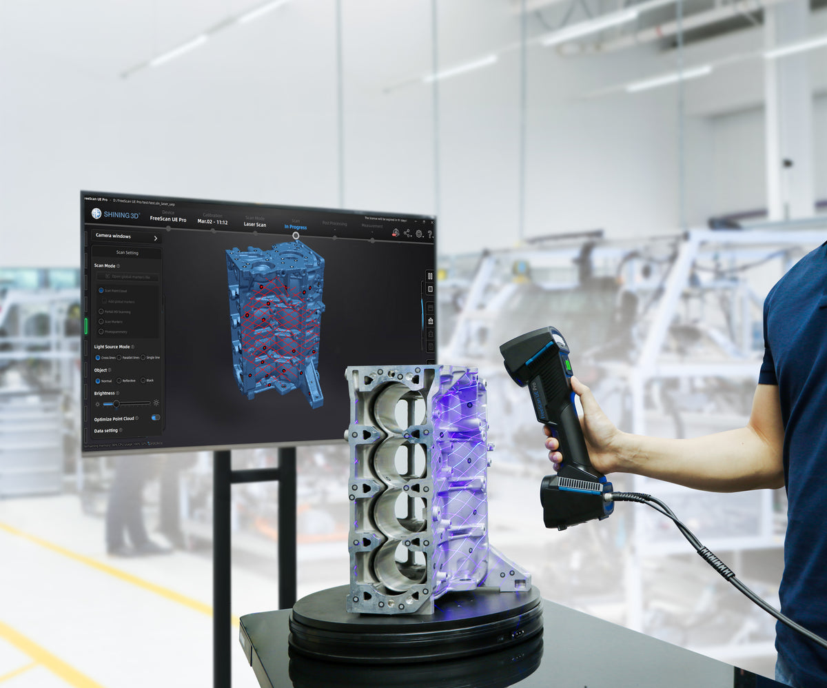 FreeScan UE Pro scanning an engine block with live scan data on screen
