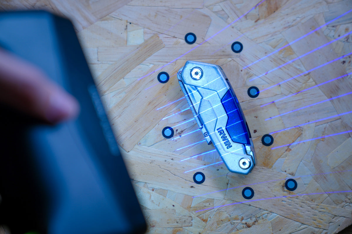 EINSTAR Rockit scanning a small mechanical part with parallel blue laser lines