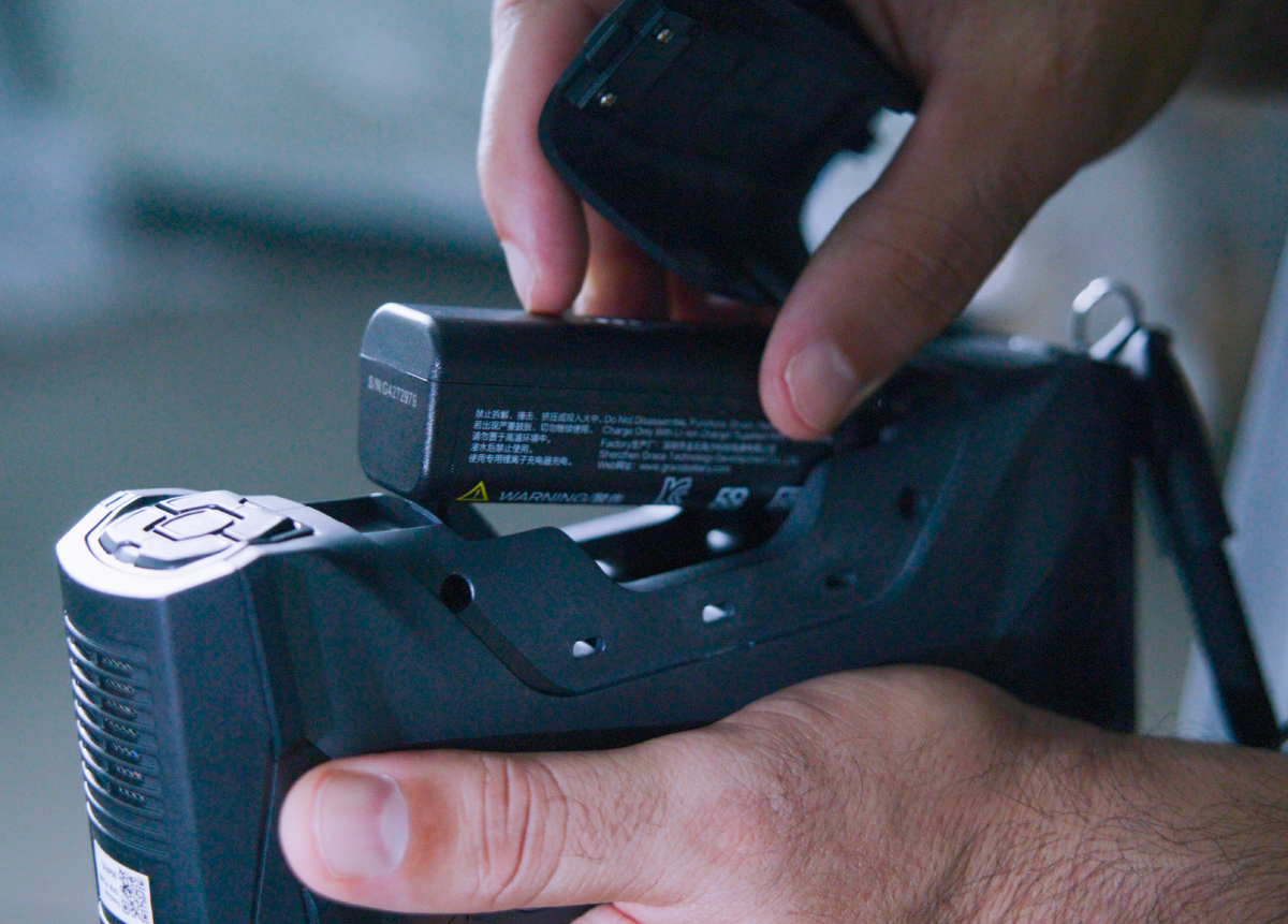 Rechargeable battery being fitted to the FreeScan Combo+ Wireless scanner