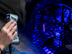 FreeScan Combo scanning an automotive component with blue laser