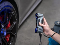 FreeScan Combo scanning an automotive wheel and brake assembly